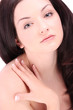 Beautiful woman looking at camera showing hand