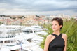 Beautiful model on the balcony of Palais des Festivals in Cannes