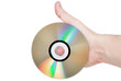 Single DVD(CD) disc hold in hand. Isolated Single DVD(CD) disc hold in hand. Isolated