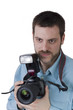 Young man with digital camera in hands