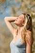 Beautiful young woman enjoying sun