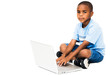 Portrait of boy working on laptop