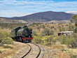 steam train coming around the corner