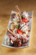Banana split with different sort of ice cream and fruit