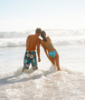 Young teenagers enjoying themselves at the sea shore