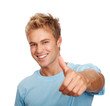 Young dude with thumbs up on white background