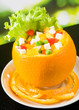 Closeup of orange stuffed by vegetarian salad Closeup of orange stuffed by vegetarian salad