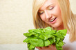 Woman with a head of lettuce