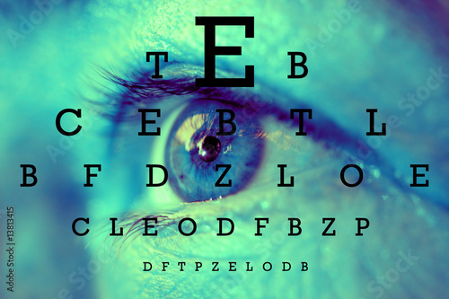 Photo: an eye with test vision chart an eye with test vision chart