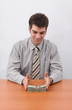 Businessman And Stack Of Money Businessman And Stack Of Money