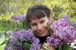 Woman with lilacs