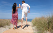 couple enjoying themselves on the beach