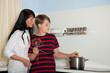 homework - son cooking with mum