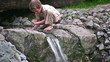 child play on small waterfall child play on small waterfall