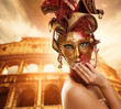 Beautiful woman in front of Colosseum (Rome, Italy)