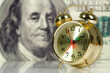 Clock on big dollar background Clock on big dollar background