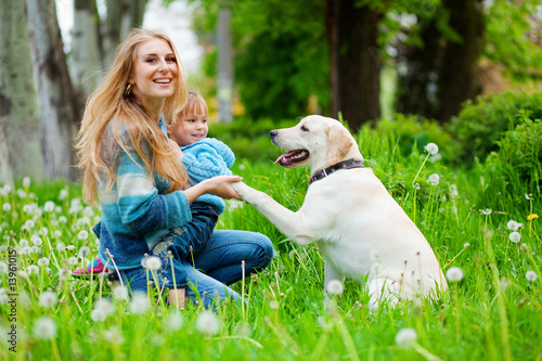 Photo: Woman with girl and dog Woman with girl and dog