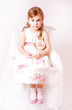 Foto: Beautiful little girl in dress Beautiful little girl in dress