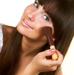 girl with brush for blush
