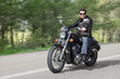 Young Rider Driving Motorcycle Young Rider Driving Motorcycle