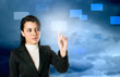 Businesswoman pushing a button