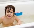 little girl take a bath