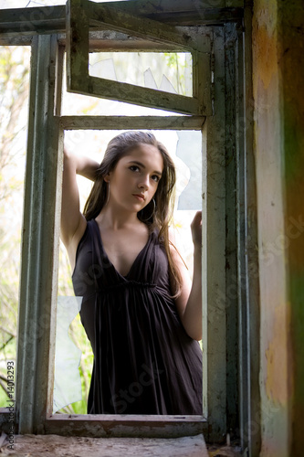 Photo: The girl in a window The girl in a window