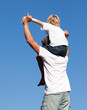 Father with his son on his back