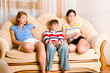 Girls and the boy on sofa