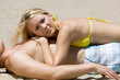 An attractive women resting on her boyfriend