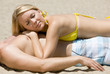A beautiful women resting on her boyfriend