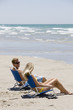 A couple enjoying themselves on the beach