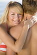A happy young couple on the beach