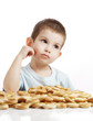 The little boy with a heap of kalaches
