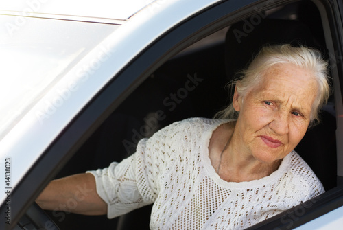 Elderly woman  driving car