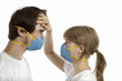 Young couple wearing  blue masks