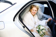 portrait of the bride in the wedding car