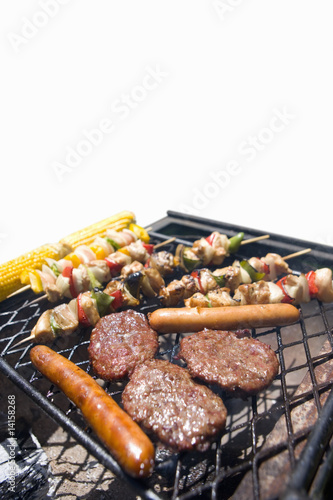 Photo: Food on barbeque, cut out Food on barbeque, cut out