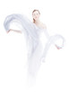 Young woman waving by light fabric over white high key