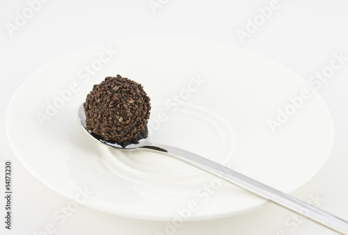 Photo: Chocolate truffle on a silver spoon II Chocolate truffle on a silver spoon II