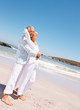 Full length: Senior couple enjoying on a summer vacation