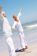 A mature couple having fun at the beach