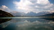 Mountain lake. Time lapse with white clouds. Mountain lake. Time lapse with white clouds.