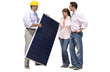 Construction worker showing solar panel to young couple, cut out