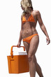 Young woman in orange bikini carrying cooler, low angle view, cut out
