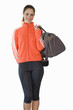 young woman holding kit bag, cut out
