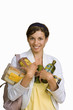 woman holding shopping items, cut out
