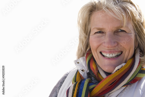 Photo: close-up of senior woman in colourful scarf, cut out close-up of senior woman in colourful scarf, cut out