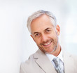 Closeup portrait of senior cheerful business man