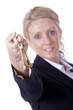 Photo: Businesswoman offering keys Businesswoman offering keys